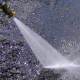 How does a hot water pressure washer work?